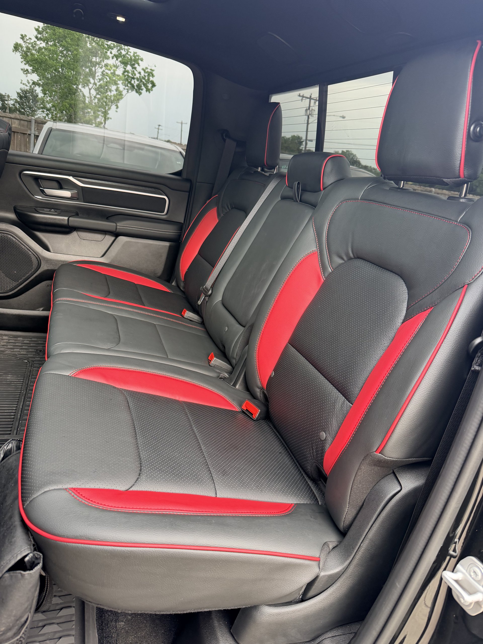 RAM truck with black and red leather rear seat build, Level Up Customs, Alvin TX