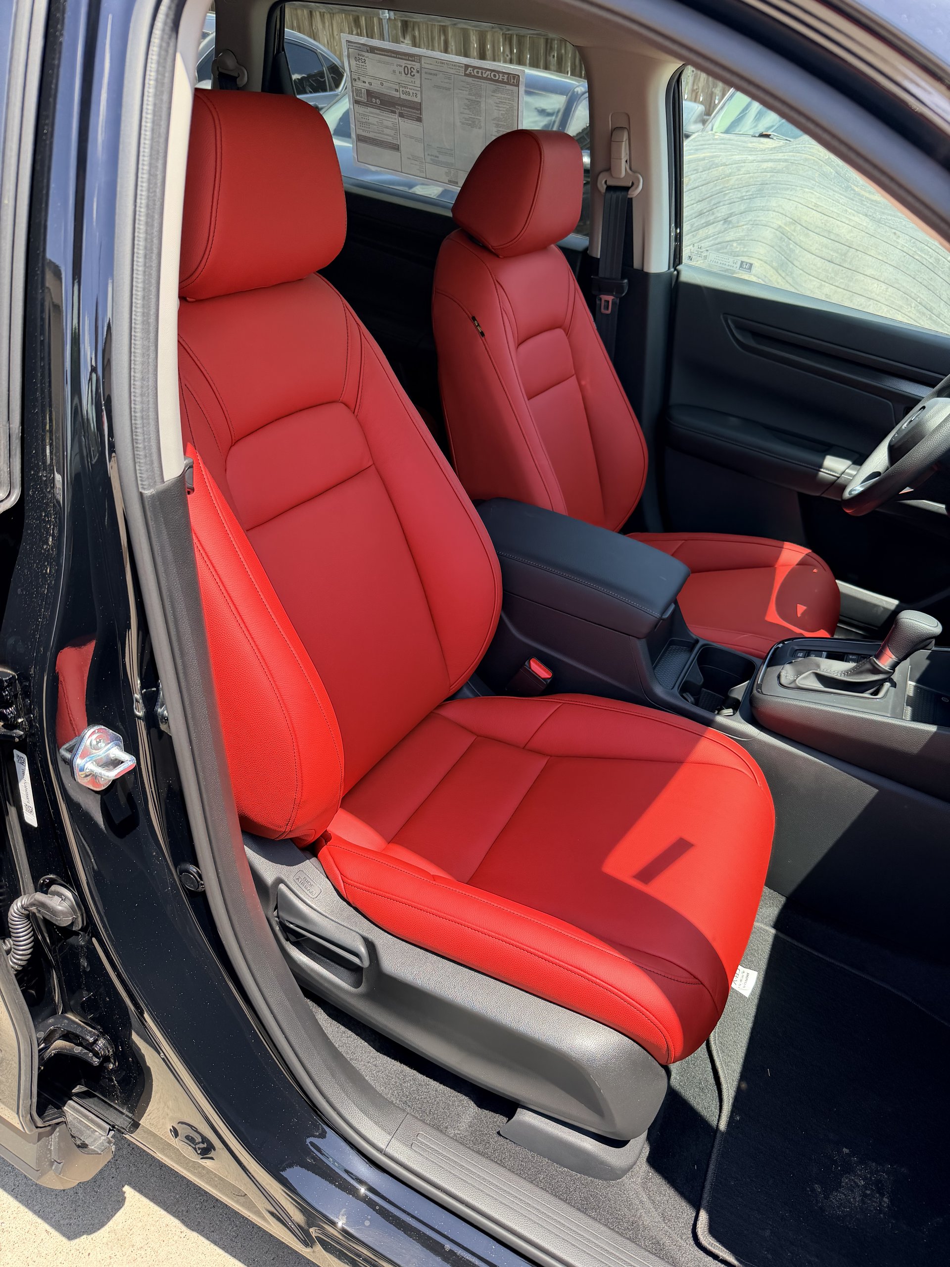 Custom red leather front seats installed in a vehicle, Level Up Customs, Alvin TX